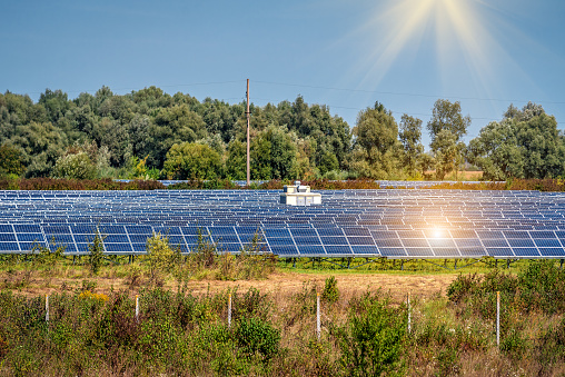 Solar panel station, photovoltaic, alternative electricity source - concept of sustainable resources. Industrial theme