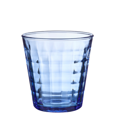 Empty transparent glass with ice cube rocks isolated on white background. Clipping path