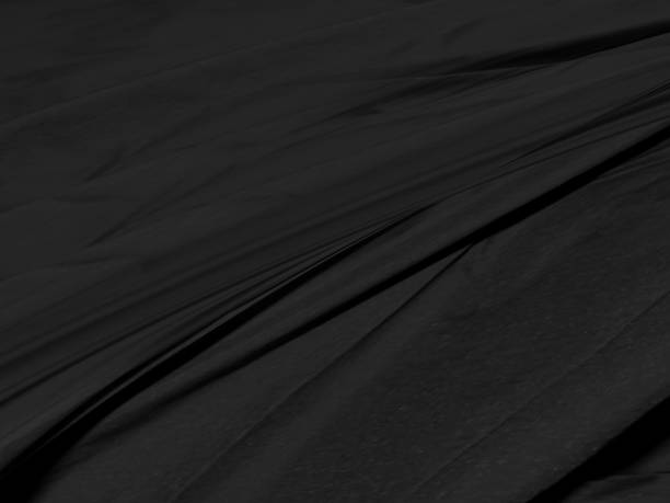 istock beauty fashion textile soft fabric black abstract. smooth curve shape matrix decorate background 1440739968