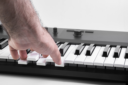 Midi synthesizer on white background