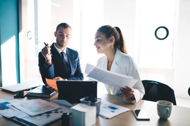 istock Business people brainstorming in modern workspace 1440742432