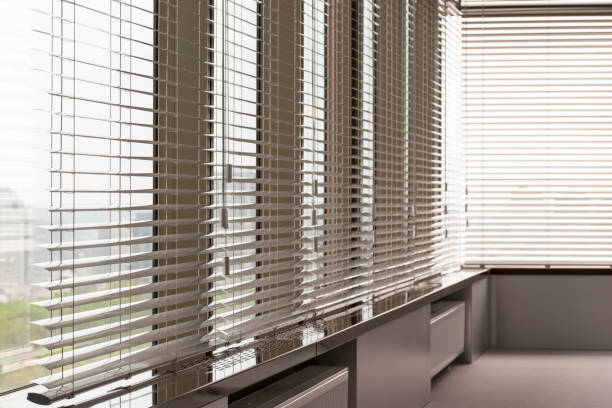 istock Venetian blinds closeup on the window. 1440742681