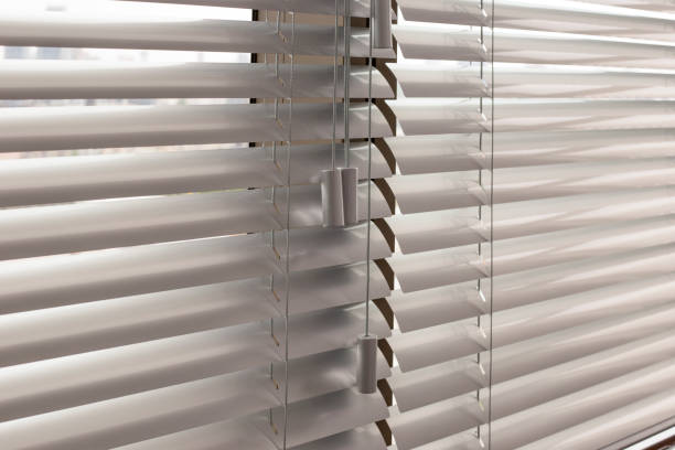 istock Venetian blinds closeup on the window. 1440742684