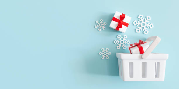 istock Shopping basket with gift boxes and snowflakes on blue background with empty space for text, copy space. Buying presents. Christmas, New Year shopping, sale. Xmas banner. 3D illustration. 1440744465