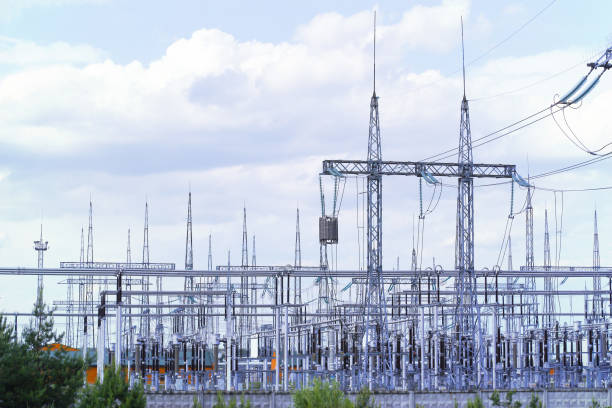 istock High and low electric poles against the sky 1440745457
