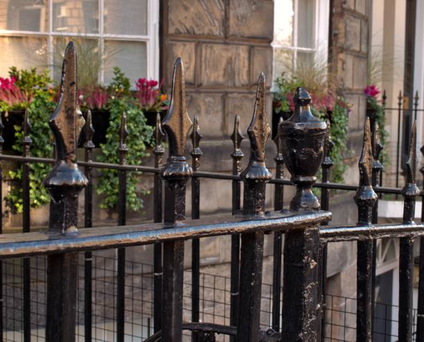 istock Black metal fence 1440749440