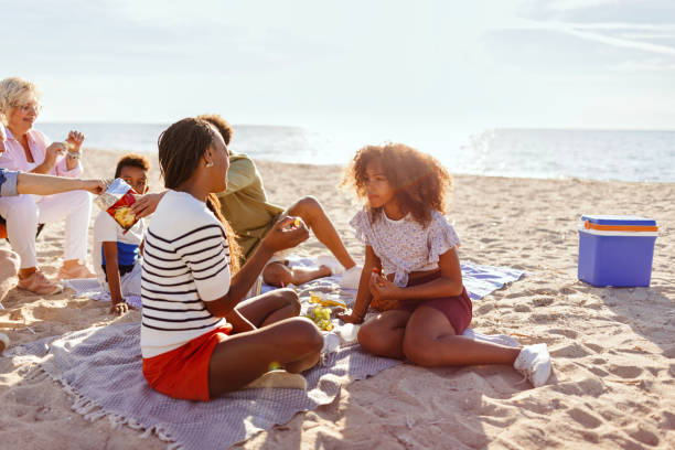 istock Happy multi generation family spending some time together at the beach 1440749667