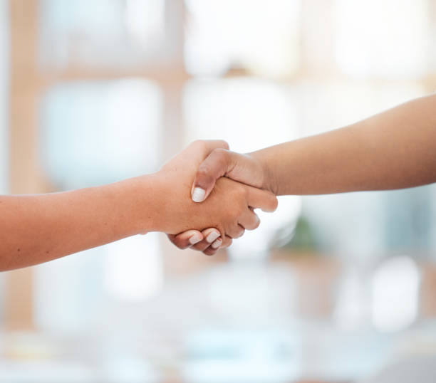istock Handshake, support and b2b collaboration partnership success in team meeting and welcome employee to startup company. Shaking hands, thank you and contract deal after interview with business manager 1440750534