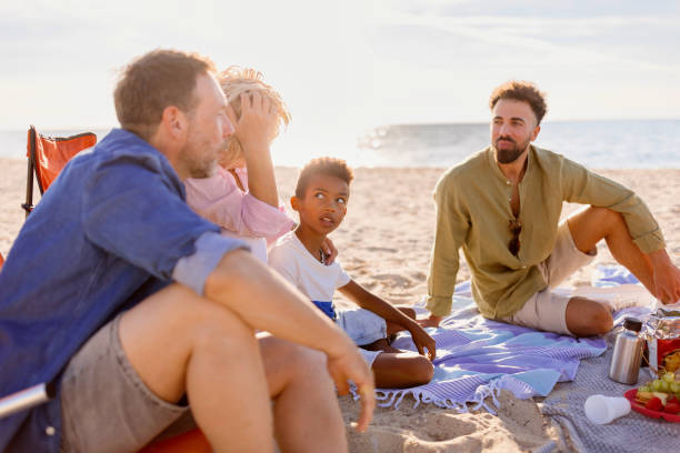 istock Happy multi generation family spending some time together at the beach 1440750961