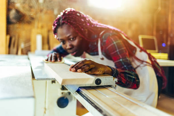 istock Craftswoman sanding down one of her project 1440753331