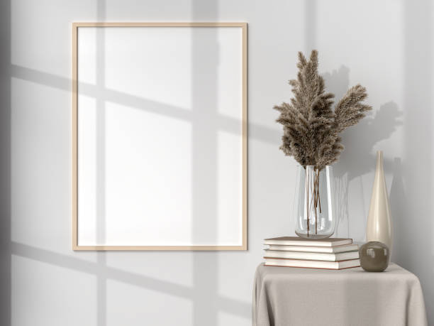 istock Blank picture frame for photographs, art, graphics with Leaves. Frame poster mockup template on the wall in home interior. 3D rendering 1440753469