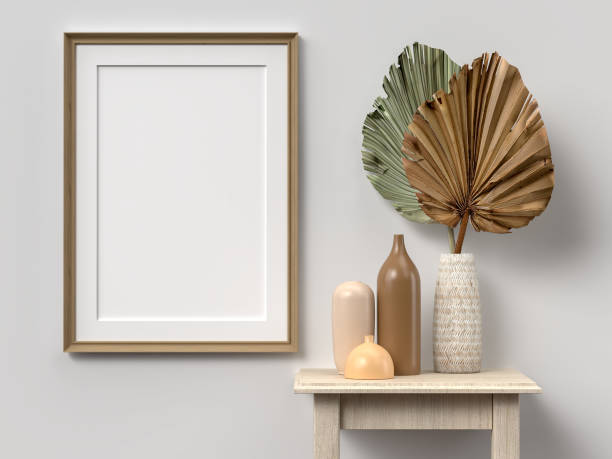 istock Blank picture frame for photographs, art, graphics with Leaves. Frame poster mockup template on the wall in home interior. 3D rendering 1440753473