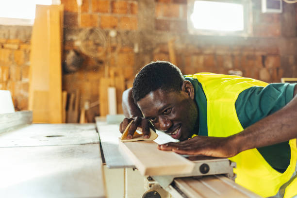 istock Man sanding wooden furniture 1440753622