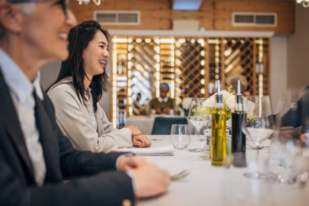 istock Business people in restaurant 1440754328
