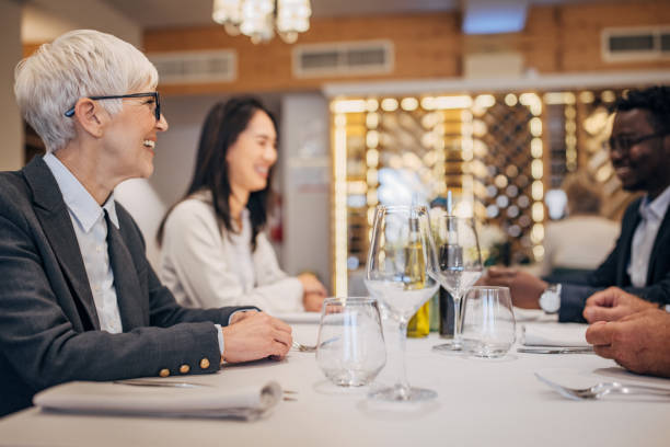 istock Business people in restaurant 1440754342
