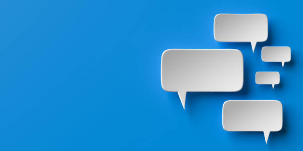 istock Social media notification icons, white speech bubbles on blue background copy space. 1440755809
