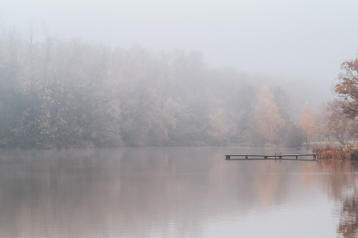 Beautiful lake in a foggy weather