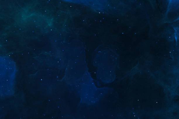 istock Computer drawn illustration of particles with a dark background 1440757100