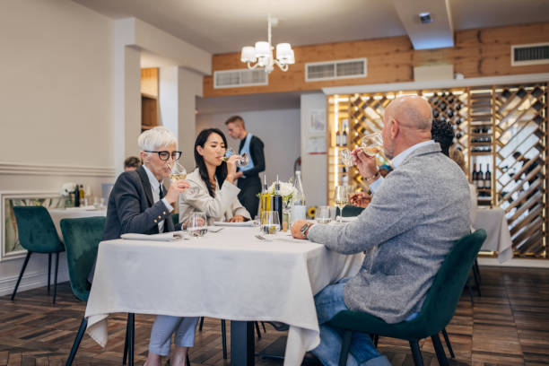 istock People on lunch in luxury restaurant 1440757517