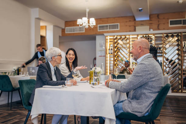 istock People on lunch in luxury restaurant 1440757643