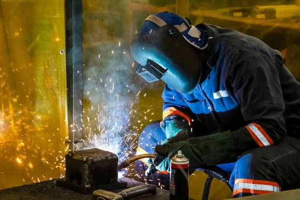 istock Male working with a welding torch 1440758458