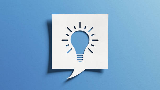 istock Innovation and idea symbol with light bulb shape. Concept about creativity, invention, innovative solutions for business communication. White cutout paper over blue background. 1440760343
