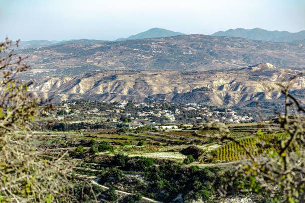istock Beautiful landscape scene with fields and mountains during the daytime 1440760536