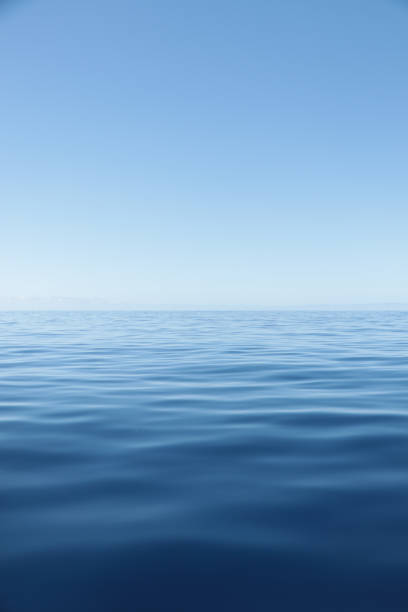 istock Vertical shot of a blue sea 1440760639