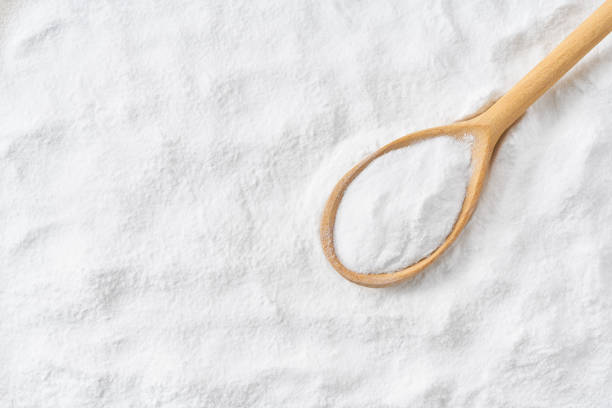 istock Background of baking soda powder texture close-up. Copy space for text. 1440760707