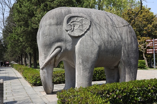 A statue of an elephant in the Ming Emperors Tomb, Nanjing, China