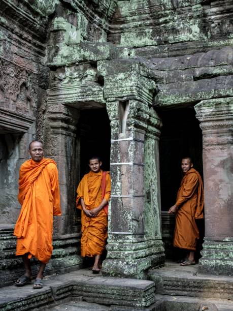 Siem Reap, Cambodia- 20 October 2013: Tourist walk admire the beauty of Angkor Wat or Angkor Temples, World-Famous Heritage Site most popular tourist attraction