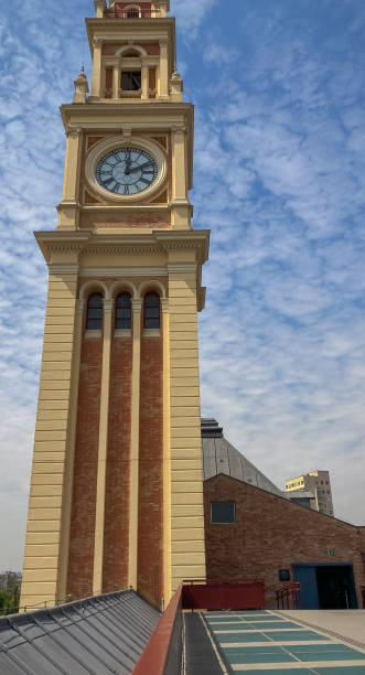 istock Clock tower at Luz station and terrace in sunny day 1440762537