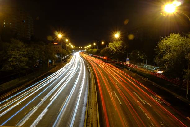 istock Light trails of north second ring road traffic flow in Beijing, China 1440762919