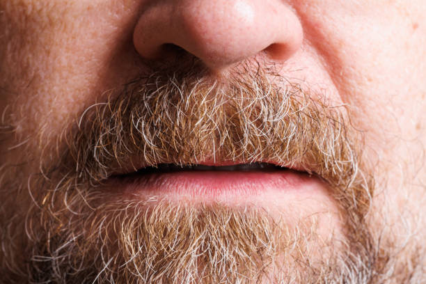 istock middle aged male, with grayed goatee , close up 1440766076