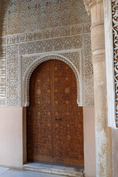 istock Islamic pattern on the massive doors of the Alhambra Palace, Grenada, Spain 1440766443