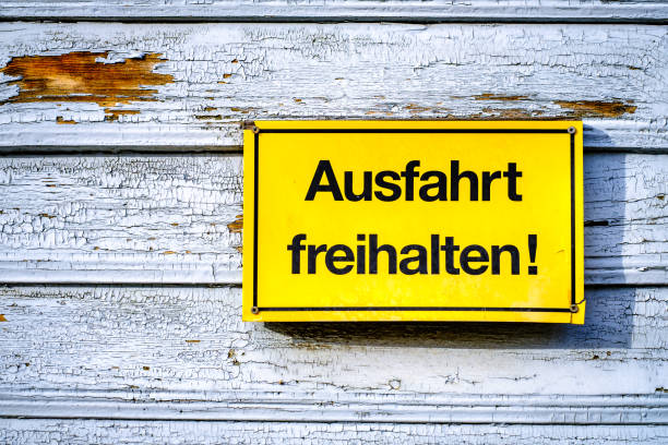 istock no parking sign in germany - translation: keep the exit clear 1440767719
