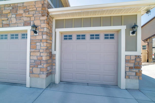 istock Modern garage doors of a beautiful building on a sunny day 1440767768