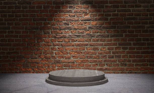 istock 3D rendering of a podium under a limelight against a brick wall 1440768840