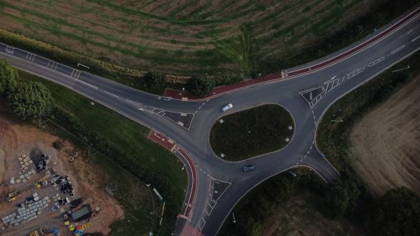 istock Top view of a roundabout with a construction site nearby 1440774437