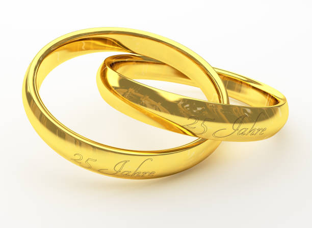 istock Golden wedding rings with german writings 
