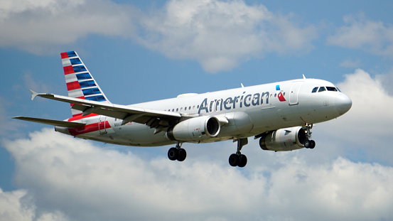 Chicago, United States – July 02, 2021: The American Airlines flight preparing for landing at Chicago O'Hare international airport