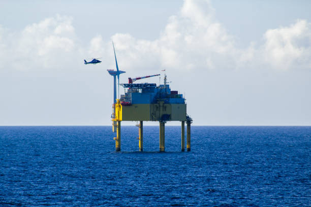 istock Helicopter approaching a transformer platform at an offshore wind farm 1440778865