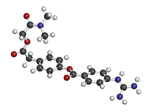 Camostat drug molecule. Serine protease inhibitor, investigated for treatment of Covid-19. 3D rendering. Atoms are represented as spheres with convent