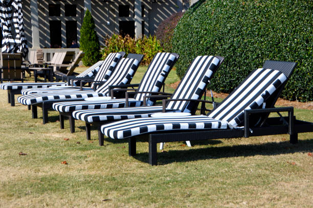istock Empty lounge chairs at hotel resort 1440781036