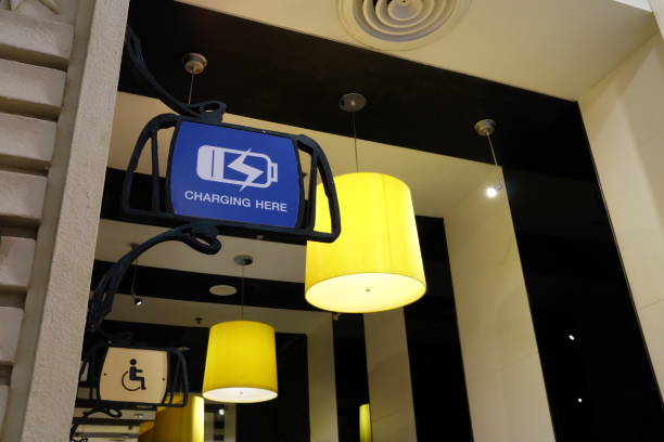 istock Charging Here Sign in Free Charging Area that Service for Customers. 1440781170