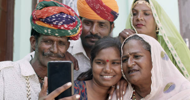 istock Happy Indian family is taking a selfie 1440781307