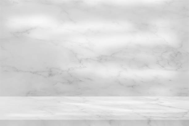 istock Abstract Luxury White Marble Table with Wall Background with Light Beam on Surface, Suitable for Product Presentation Backdrop, Display, and Mock up. 1440781562