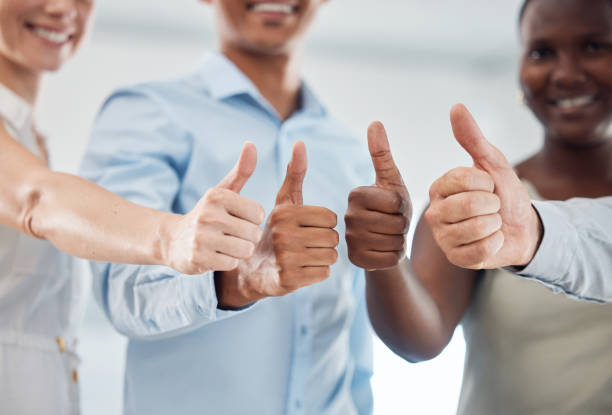 istock Corporate thumbs up and teamwork with success hands for  business workforce development and motivation. Agreement, partnership and winning achievement together in professional work team. 1440781810