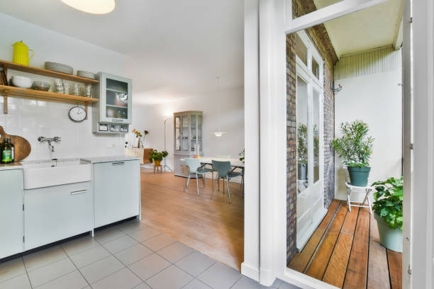 istock Modern apartment interior in light colors with wooden details 1440781821