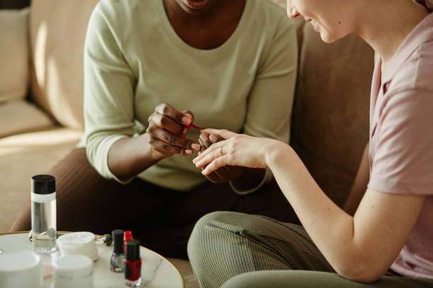 Women Doing Manicure at Home Closeup